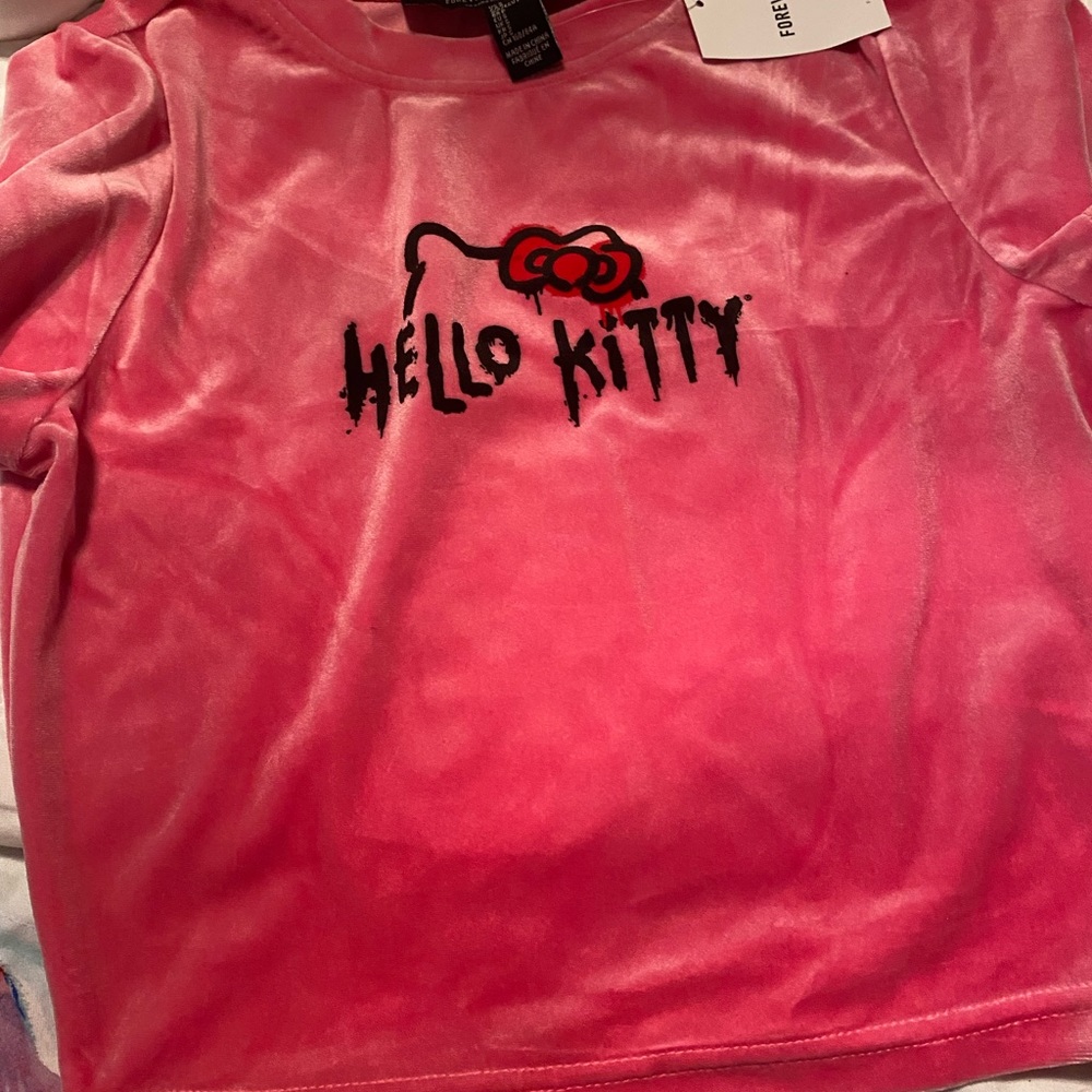 Hello kitty forever21 pink velour crop top. NWT. Size small.